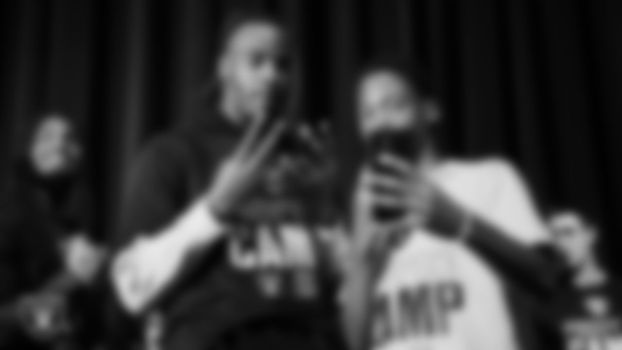 Las Vegas Raiders wide receiver Dont'e Thornton Jr. (10) takes a selfie with an athlete during the Raiders Prospect Camp at Rancho High School.