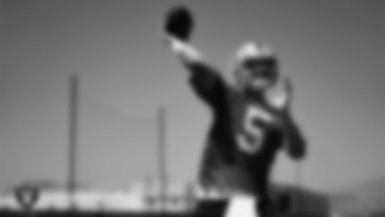 Las Vegas Raiders quarterback Cam Miller (5) on the field for mandatory minicamp at Intermountain Health Performance Center.