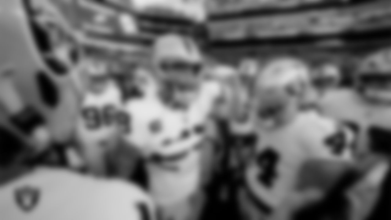 The Las Vegas Raiders huddle before the regular season away game against the Philadelphia Eagles at Lincoln Financial Field.