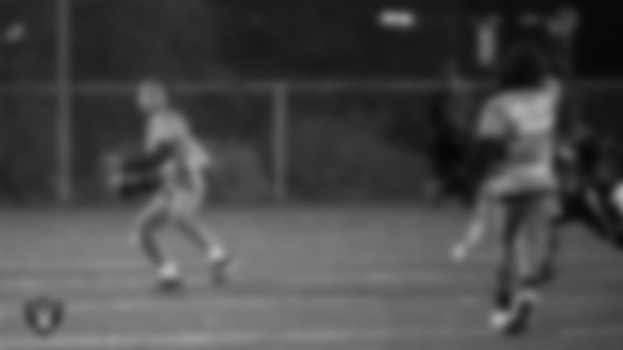 Athletes from the East Division and West Division of the City of Las Vegas Silver and Black Youth Flag Football League compete in the championship game at All American Park.