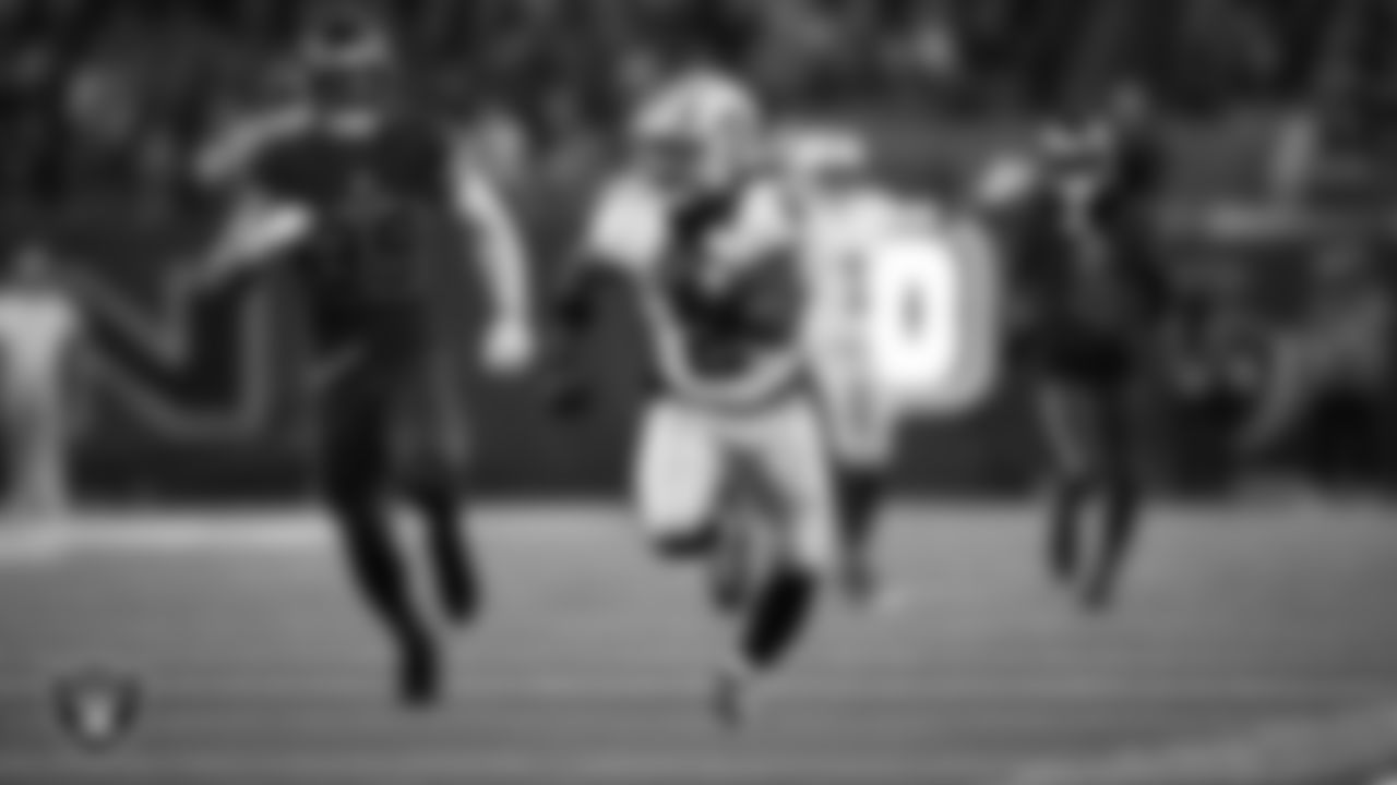 Las Vegas Raiders running back Ashton Jeanty (2) runs after making a 60-yard touchdown catch during the regular season away game against the Houston Texans at NRG Stadium.