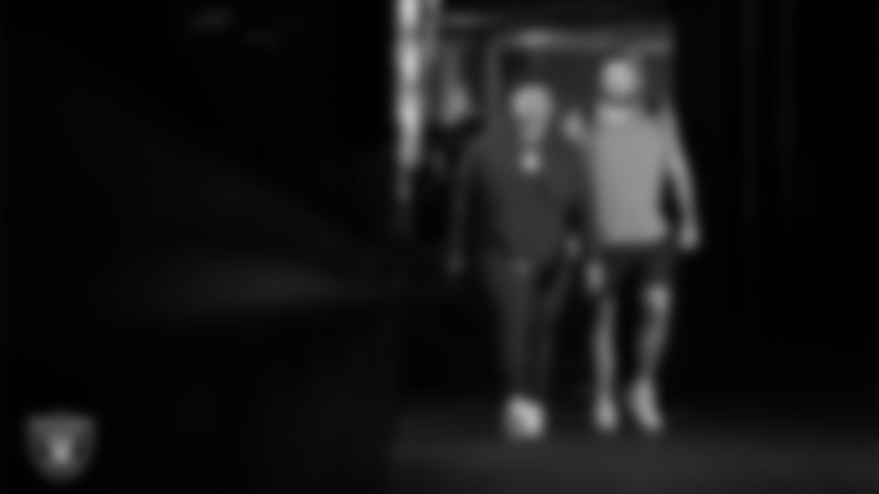 Las Vegas Raiders guard Atonio Mafi (56) and tackle Dalton Wagner (78) arrive to the regular season home game against the Kansas City Chiefs at Allegiant Stadium.