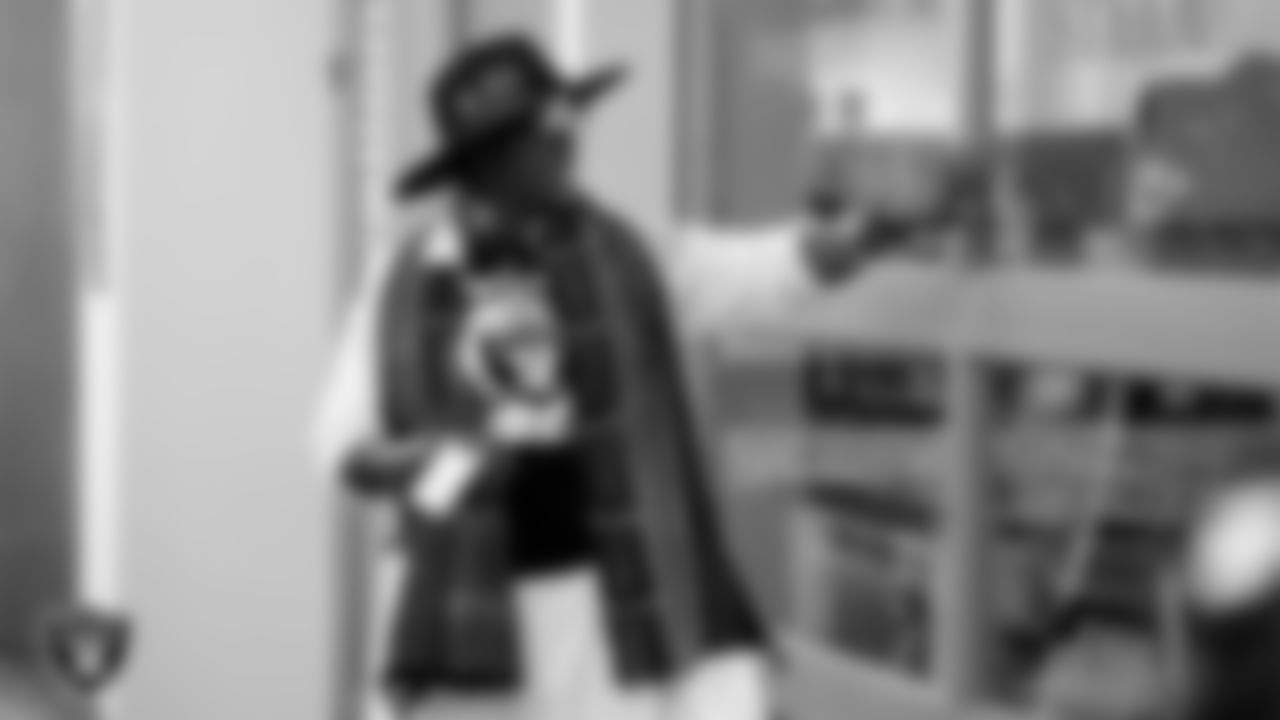 West Las Vegas Library Performing Arts Center coordinator Luciana Hudson speaks to attendees as they tour the West Las Vegas Library during the Historic Westside Tour.