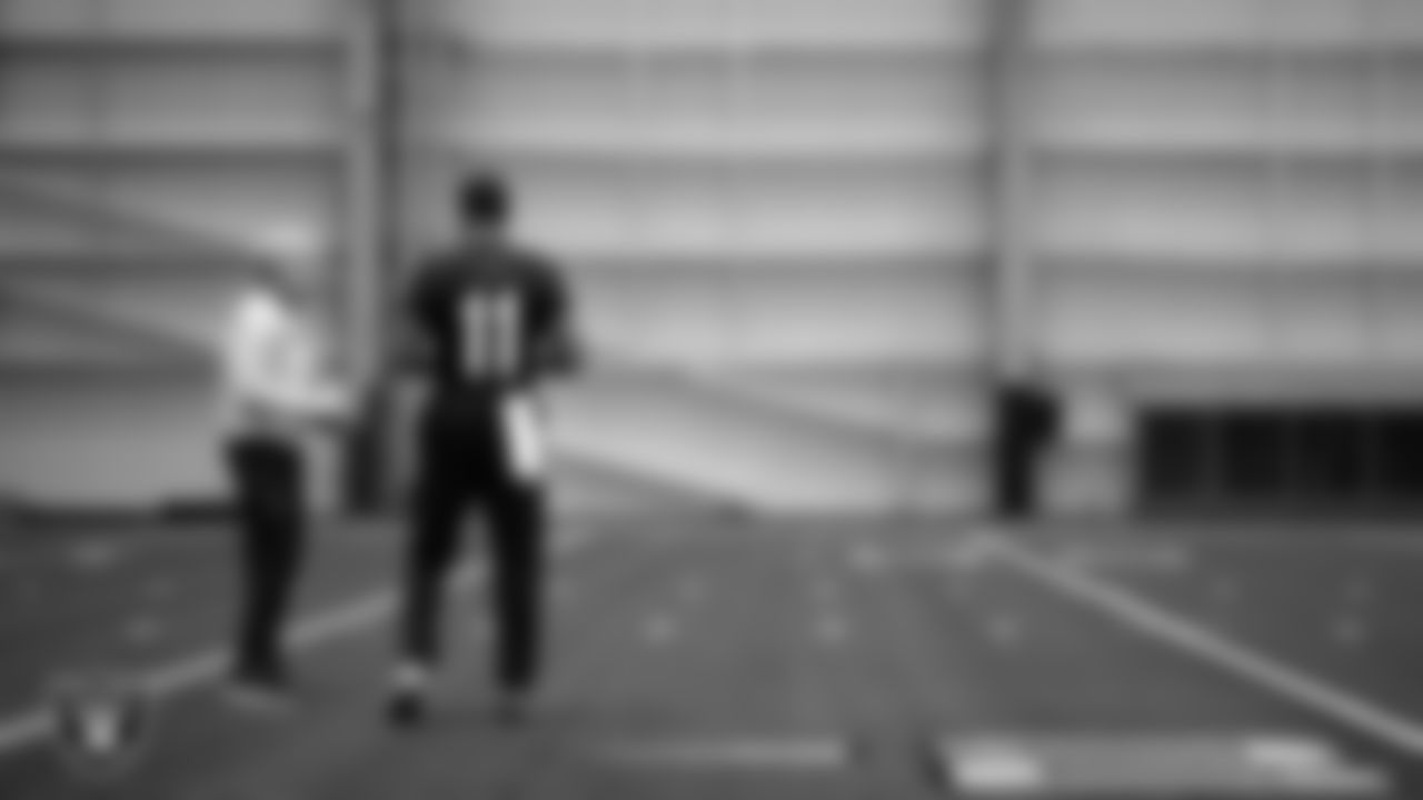 Las Vegas Raiders Head Coach Pete Carroll and safety Jeremy Chinn (11) at a workout during phase two of the offseason program at Intermountain Health Performance Center.