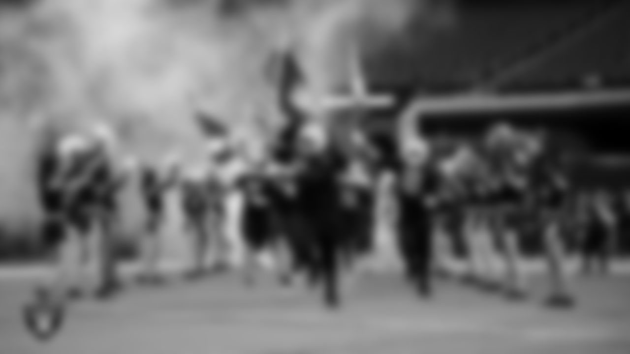 The Pinecrest Academy - Sloan Canyon football team takes the field before the NIAA 4A Division State Championship game against McQueen High School at Allegiant Stadium.