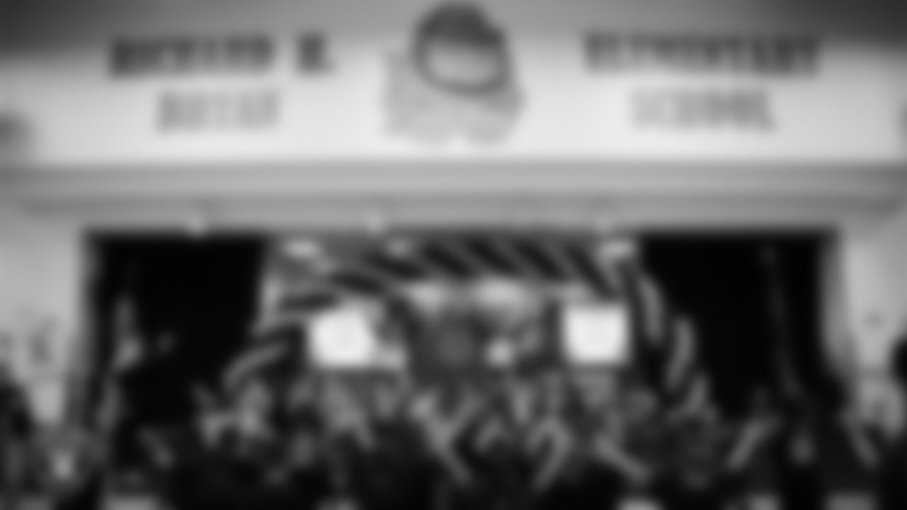 Raiderettes Ashtin and Ali teach a dance to students during a Raiders Spirit Day at Richard H. Bryan Elementary School.