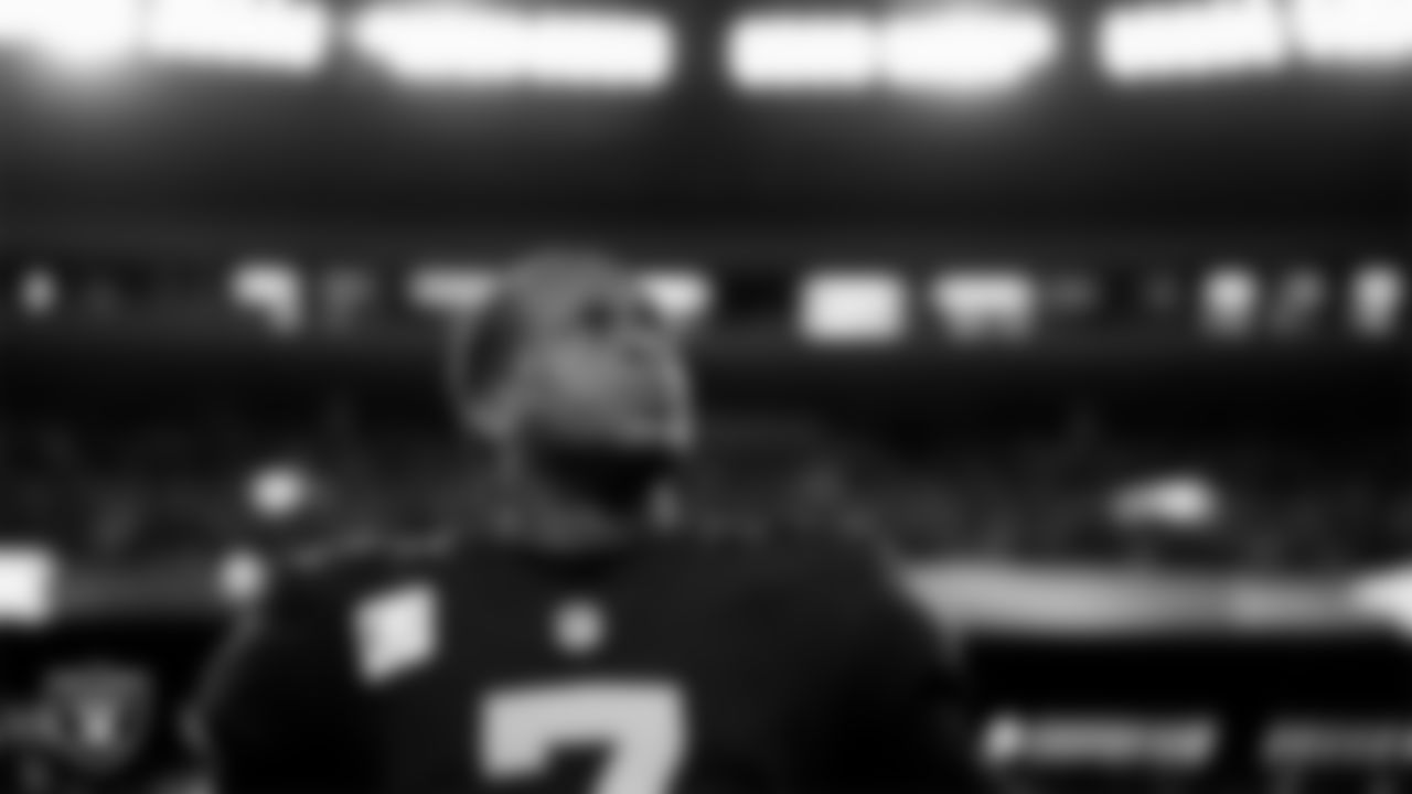 Las Vegas Raiders quarterback Geno Smith (7) during the national anthem before the regular season home game against the Los Angeles Chargers at Allegiant Stadium.