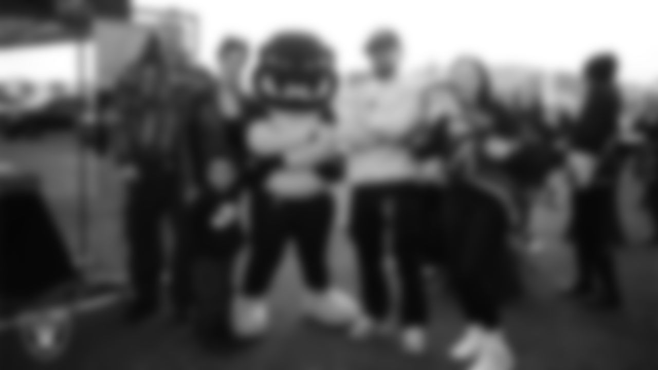 Fans enjoy a tailgate during the inaugural women's flag football game at Intermountain Health Performance Center.