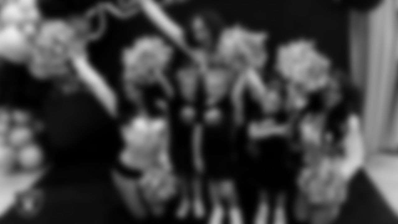 Raiderettes Ashtin, Makenna and Sloane pose for a photo with dancers during day three of summer camp at The Studio.