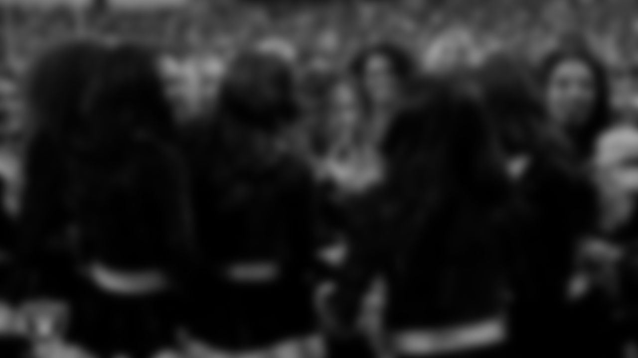 Raiderette Lexie celebrates with teammates after being named Raiderette of the Year during the regular season home game against the New York Giants at Allegiant Stadium.