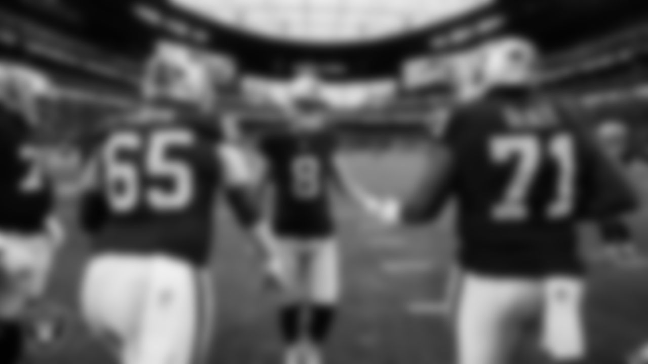 Las Vegas Raiders guard Alex Cappa (65), kicker Daniel Carlson (8) and tackle DJ Glaze (71) warming up before the regular season home game against the Cleveland Browns at Allegiant Stadium.