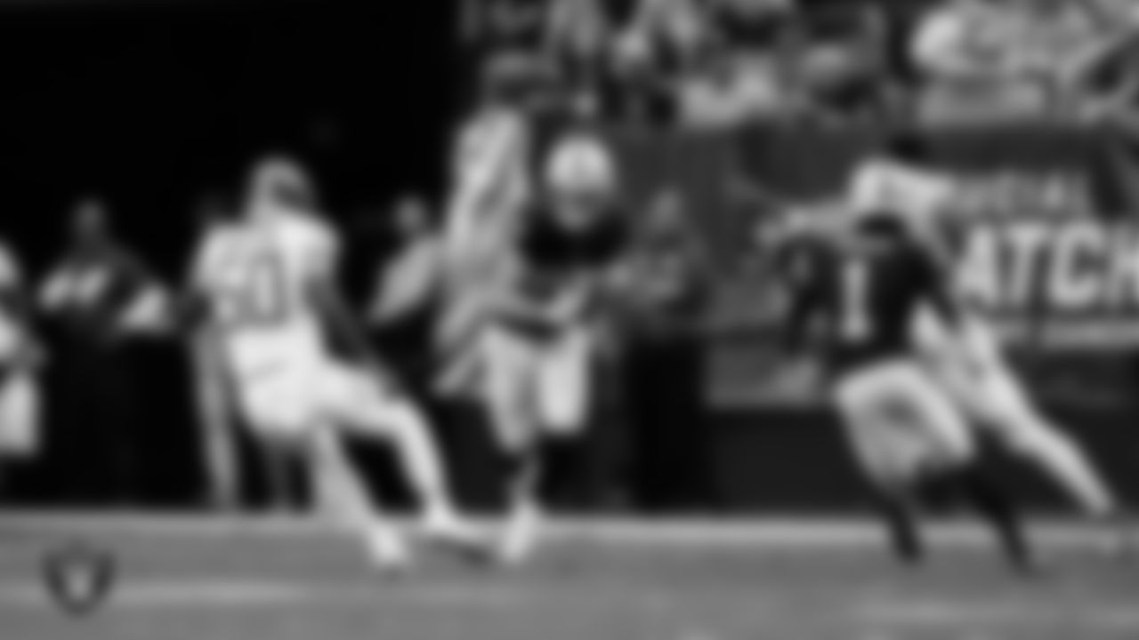 Las Vegas Raiders tight end Michael Mayer (87) runs after making a catch during the regular season home game against the Tennessee Titans at Allegiant Stadium.