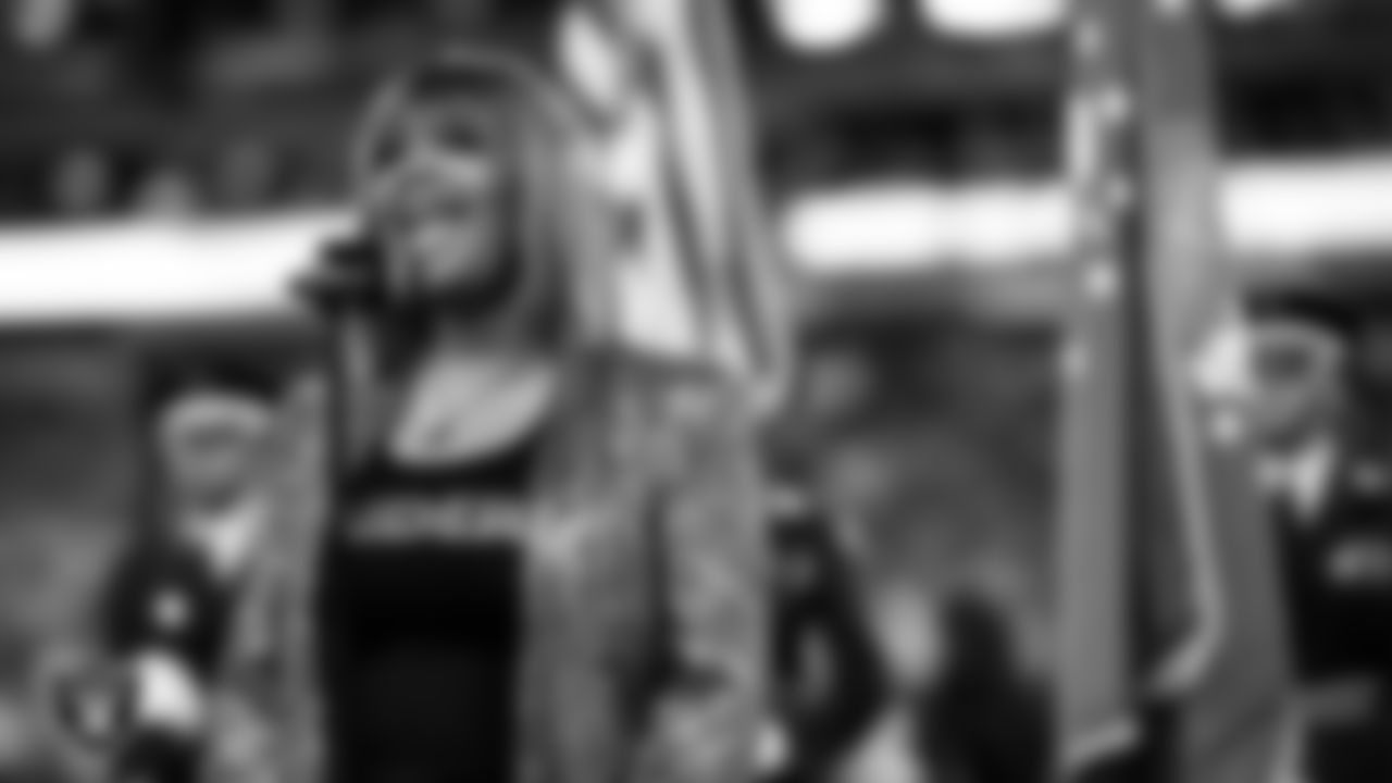 Singer Lalah Hathaway performs the national anthem before the Las Vegas Raiders' preseason home game against the Dallas Cowboys at Allegiant Stadium.