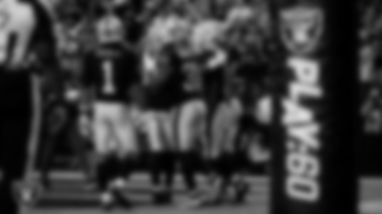 Las Vegas Raiders running back Ashton Jeanty (2) celebrates with teammates after making a 15-yard touchdown catch during the regular season home game against the Jacksonville Jaguars at Allegiant Stadium.