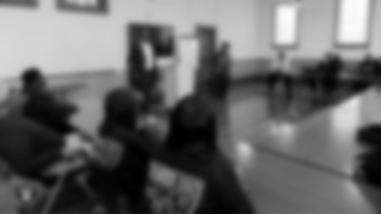 City of Las Vegas department of youth development and social initiatives management analyst Marcus Sherfield speaks to attendees as they tour the Historic Westside School during the Historic Westside Tour.