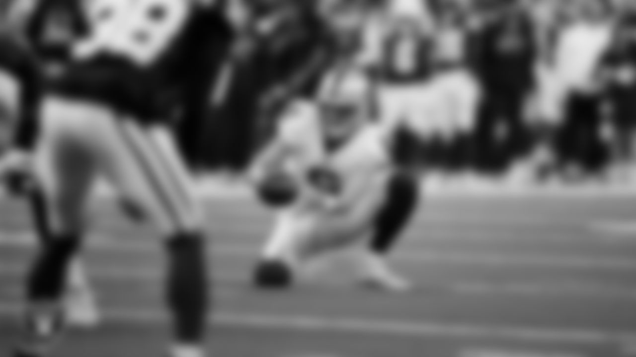 Las Vegas Raiders punter AJ Cole (6) receives the snap during the regular season away game against the Indianapolis Colts at Lucas Oil Stadium.