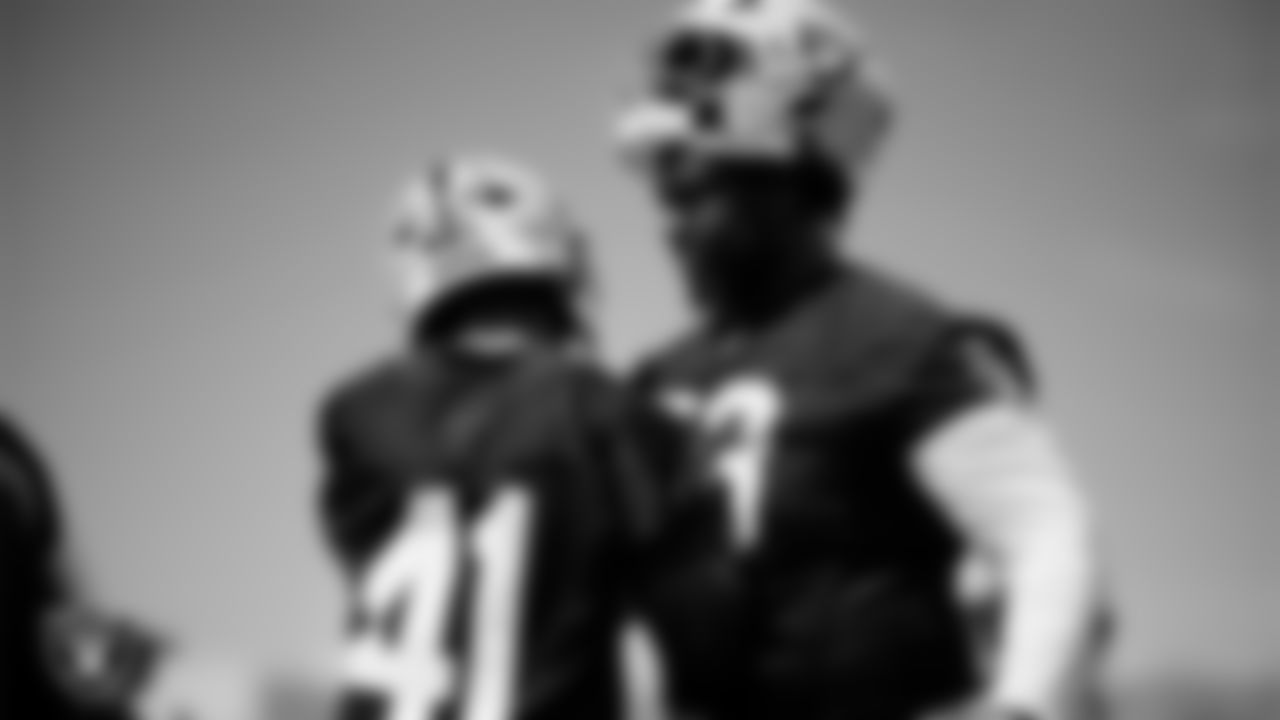 Las Vegas Raiders cornerback Greedy Vance (41) and defensive tackle Tank Booker (73) at an Organized Team Activity (OTA) at Intermountain Health Performance Center.