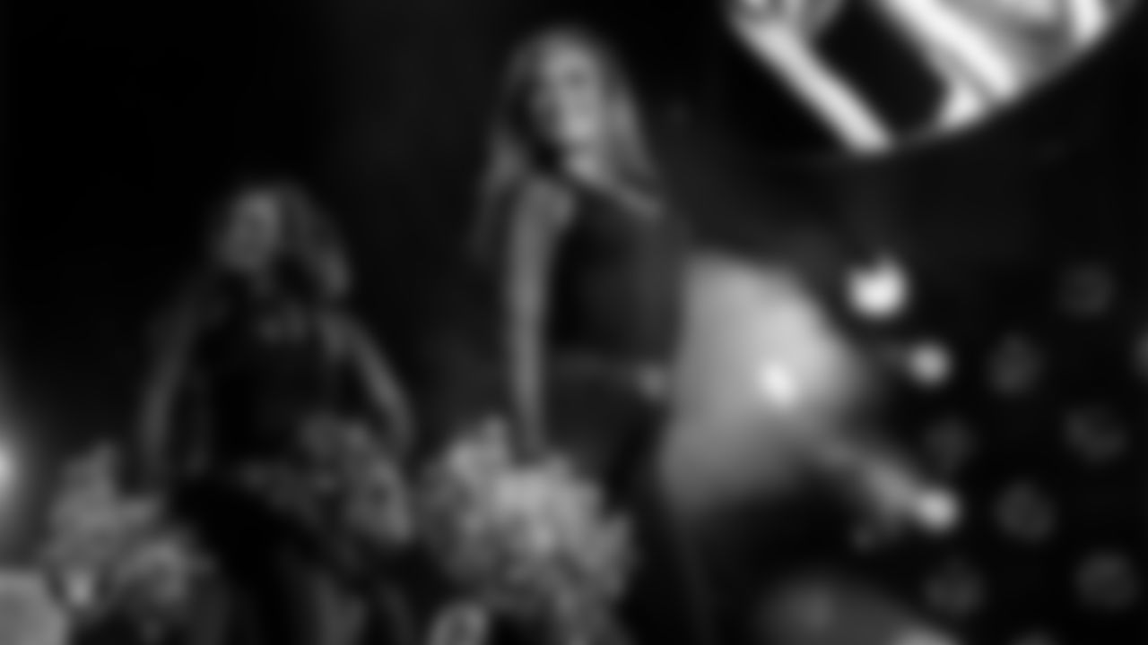 Raiderette Shelby performs with Rapper Nelly at halftime during the regular season home game against the Dallas Cowboys at Allegiant Stadium.