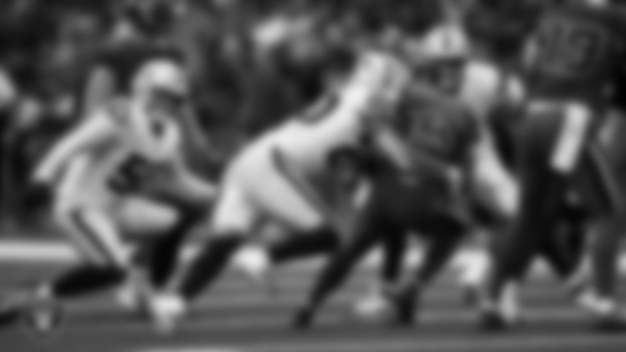 Las Vegas Raiders safety Isaiah Pola-Mao (20) makes a tackle during the regular season away game against the Houston Texans at NRG Stadium.