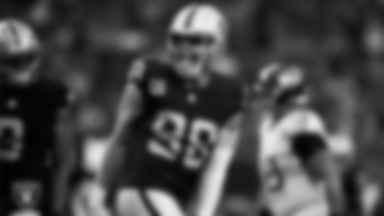 Las Vegas Raiders defensive end Maxx Crosby (98) celebrates after sacking the quarterback during the regular season home game against the Tennessee Titans at Allegiant Stadium.