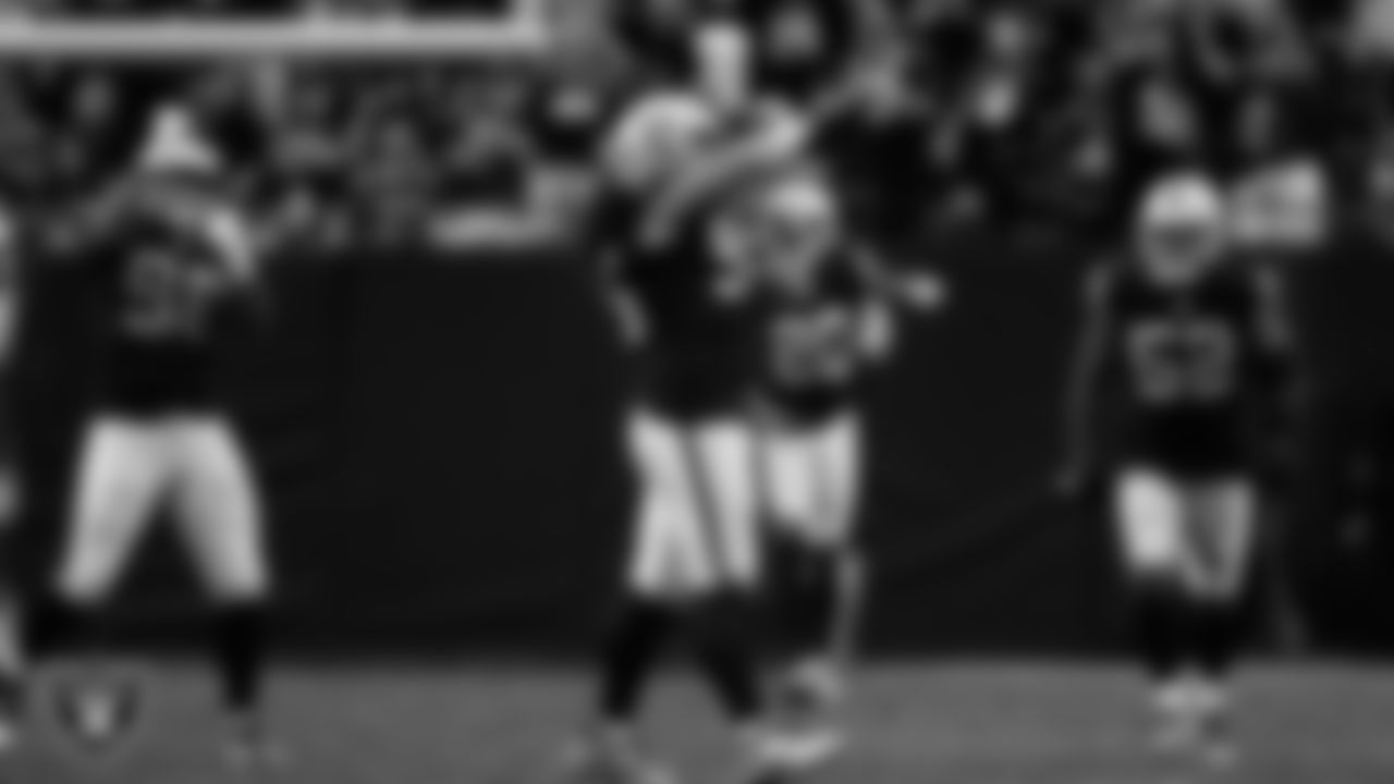 Las Vegas Raiders defensive tackle Leki Fotu (95) celebrates after sacking the quarterback during the regular season home game against the Tennessee Titans at Allegiant Stadium.