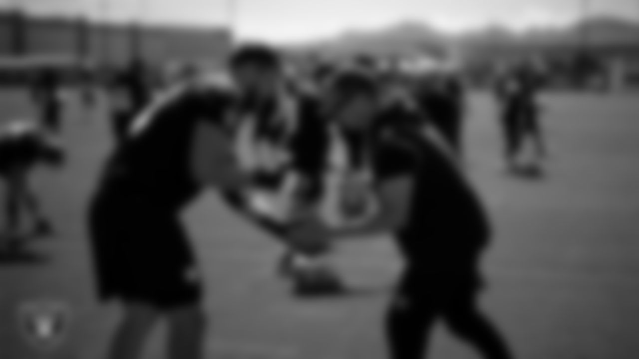Las Vegas Raiders tackle Kolton Miller (74) and head strength and conditioning coach A.J. Neibel during practice at Intermountain Health Performance Center.