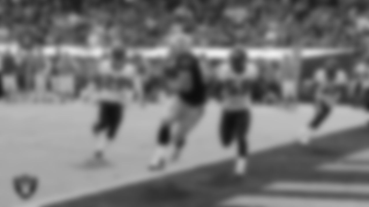 Oakland Raiders tight end Zach Miller (80) makes a 14-yard touchdown catch during the regular season home game against the Houston Texans at Oakland-Alameda County Coliseum, Sunday, October 3, 2010, in Oakland, Calif.