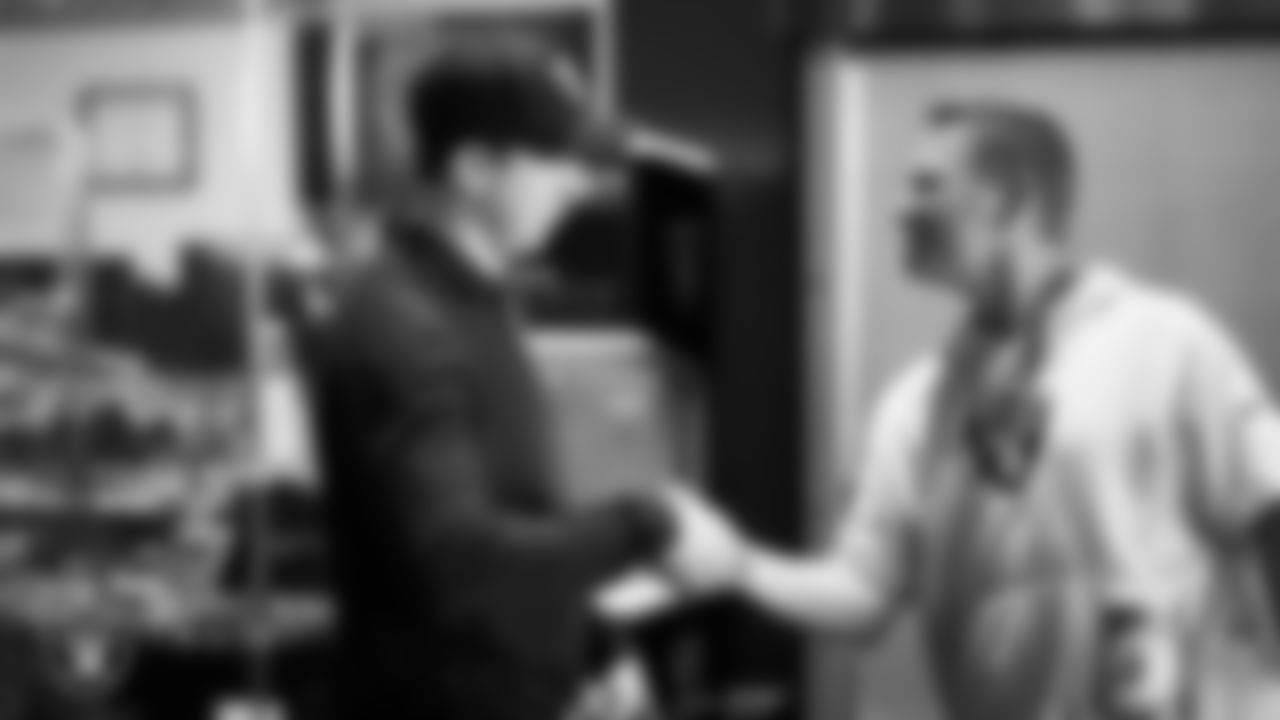 Las Vegas Raiders Head Coach Klint Kubiak and wellness coordinator Alex Guerrero in the weight room at Intermountain Health Performance Center.