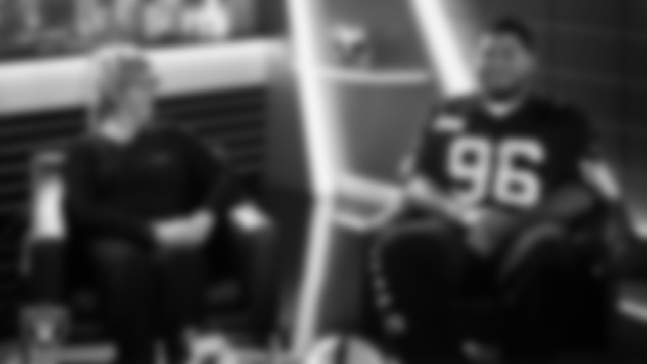 Las Vegas Raiders defensive tackle Jonah Laulu (96) works with representatives from Noah's Animal House Vegas Pet Rescue and designers to design cleats for My Cause My Cleats in Cox Studios at Intermountain Health Performance Center.