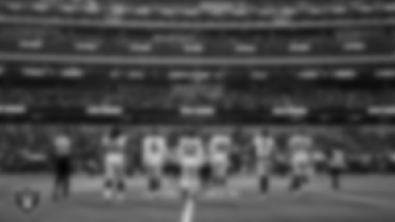 The Las Vegas Raiders walk out to the center of the field for the coin toss before the regular season away game against the the Los Angeles Chargers at SoFi Stadium.