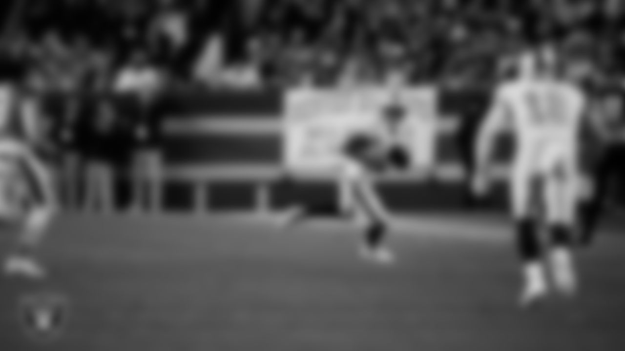 Las Vegas Raiders wide receiver Tyler Lockett (17) runs after making a catch during the regular season away game against the Denver Broncos at Empower Field at Mile High.