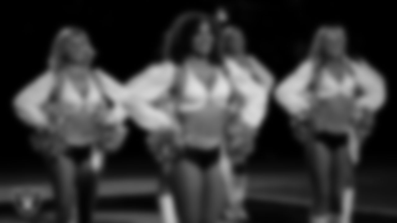 Raiderette Makenna waits to take the field for a performance during the regular season home game against the Dallas Cowboys at Allegiant Stadium.