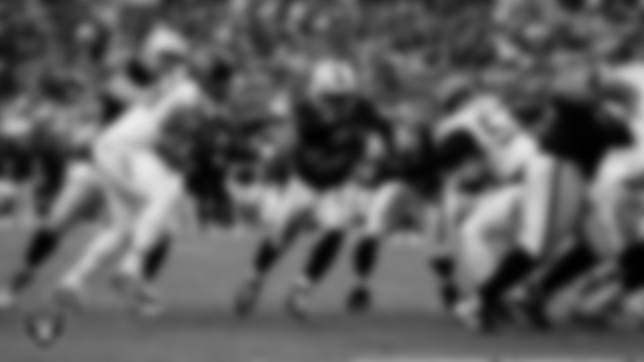 Las Vegas Raiders running back Ashton Jeanty (2) rushes for a 3-yard touchdown during the regular season home game against the Tennessee Titans at Allegiant Stadium.