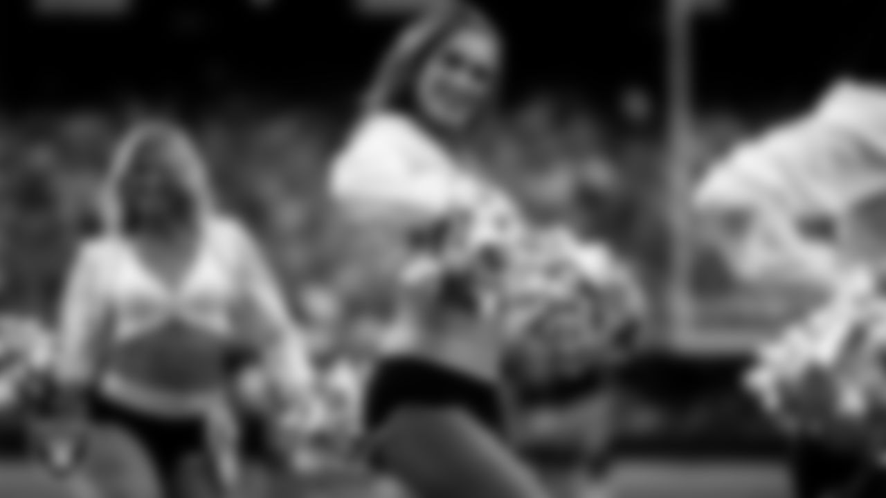 Raiderette Madisyn performs on the field during the preseason home game against the San Francisco 49ers at Allegiant Stadium.