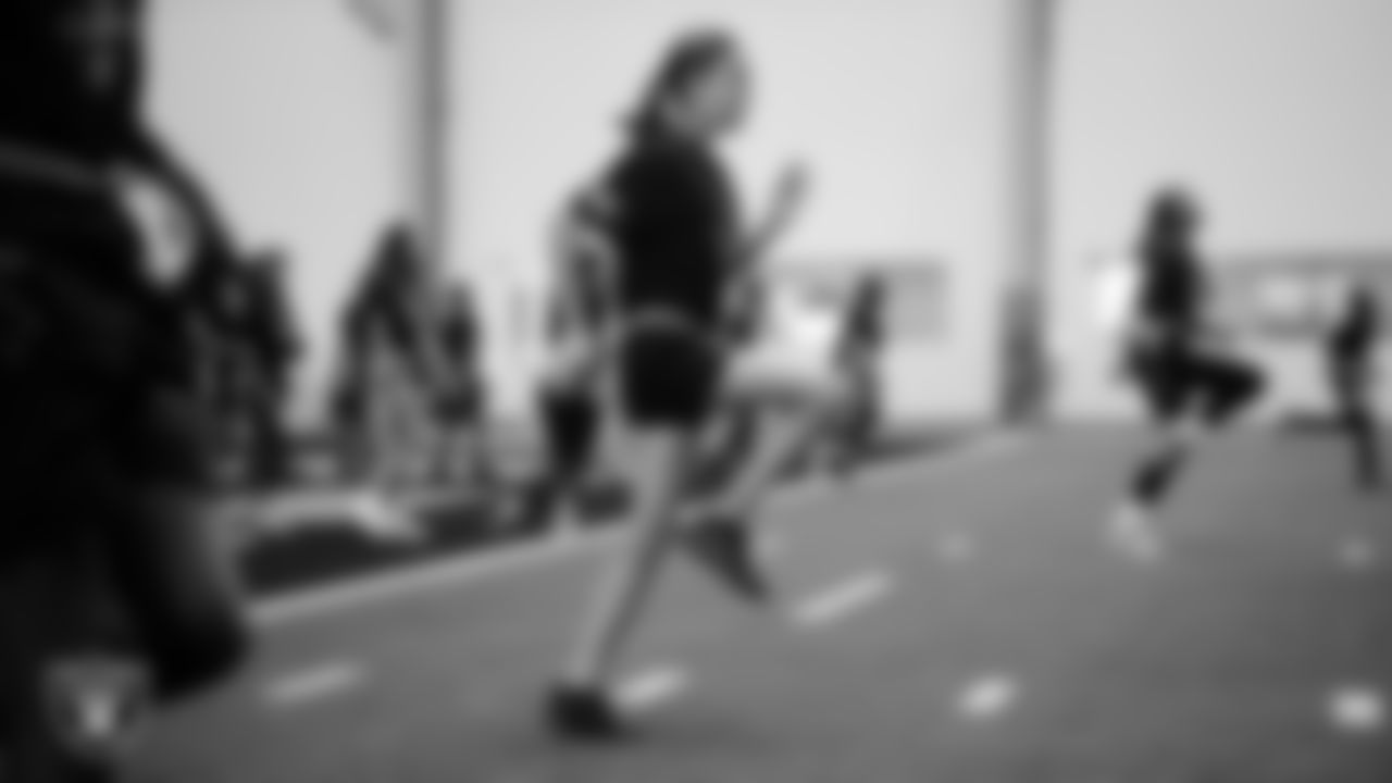 A student goes through a drill during a Raiders Junior Training Camp at Intermountain Health Performance Center.