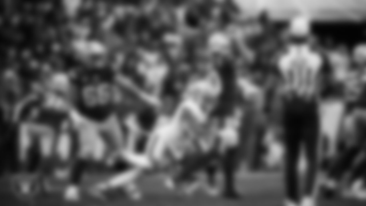 Las Vegas Raiders defensive end Malcolm Koonce (51) forces a fumble during the regular season away game against the New England Patriots at Gillette Stadium.