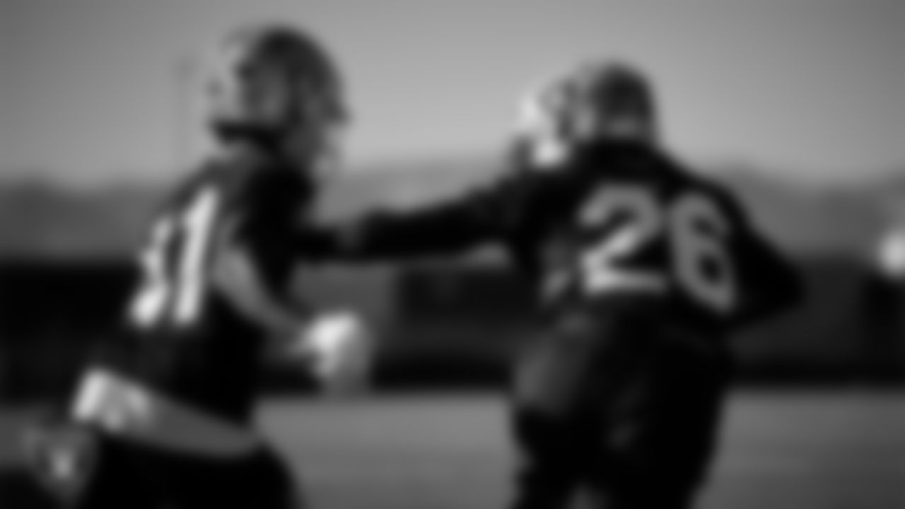 Las Vegas Raiders cornerback Greedy Vance (41) and cornerback Dairen Porter (26) during practice at Intermountain Health Performance Center.