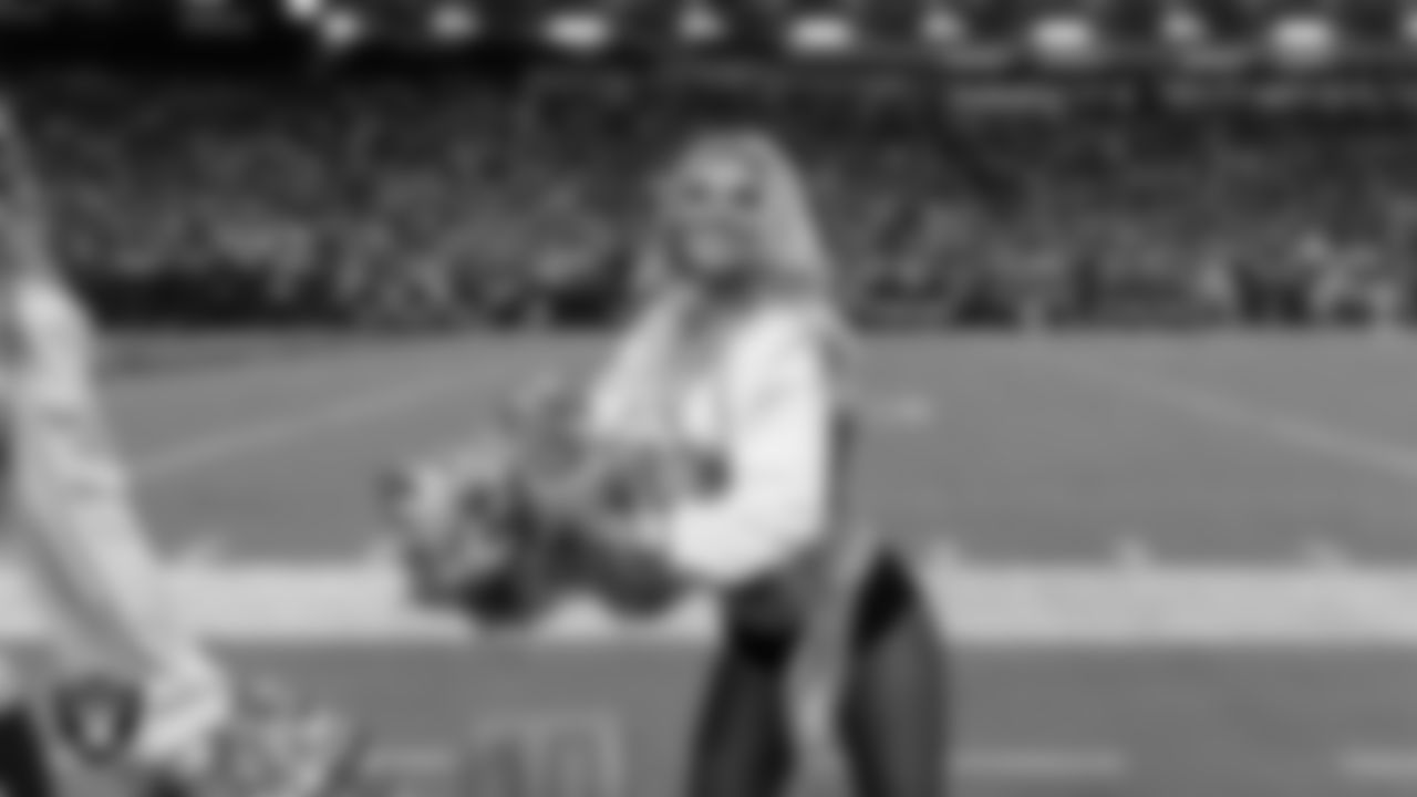 Raiderette Ali on the sidelines during the regular season home game against the Los Angeles Chargers at Allegiant Stadium.