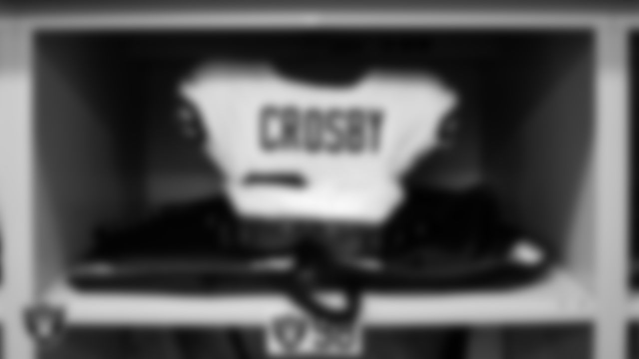 Las Vegas Raiders defensive end Maxx Crosby's (98) pads in the locker room prior to the Raiders' arrival for their regular season away game against the Los Angeles Chargers at SoFi Stadium.