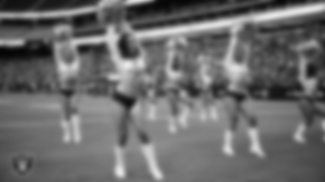 Raiderette Kylie performs on the field during a 2025 Training Camp mock game at Allegiant Stadium.