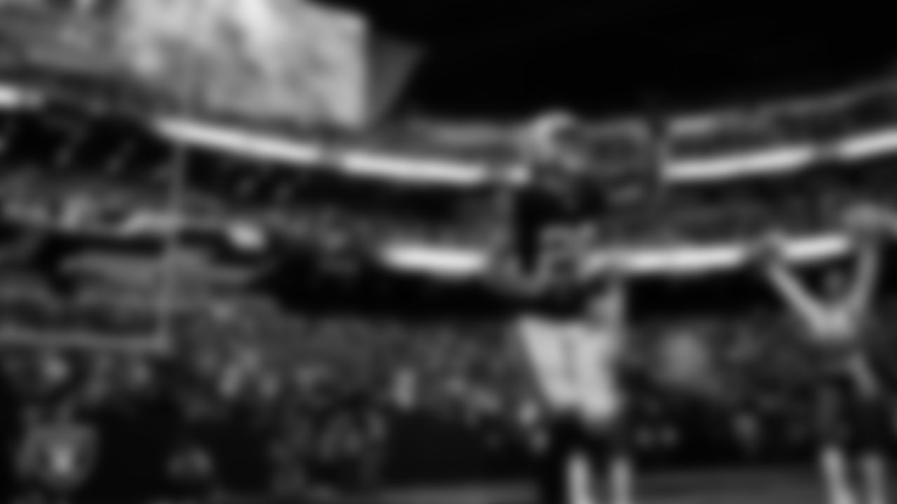 Las Vegas Raiders safety Isaiah Pola-Mao (20) is introduced onto the field before the regular season home game against the Tennessee Titans at Allegiant Stadium.