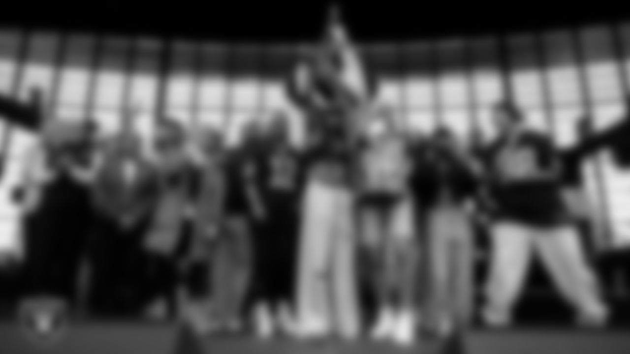 The Las Vegas Aces light the Al Davis Memorial Torch before the Las Vegas Raiders' regular season home game against the Tennessee Titans at Allegiant Stadium.
