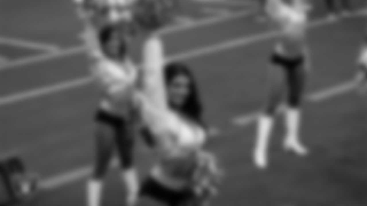 Raiderette Kylee on the sidelines during a 2025 Training Camp mock game at Allegiant Stadium.