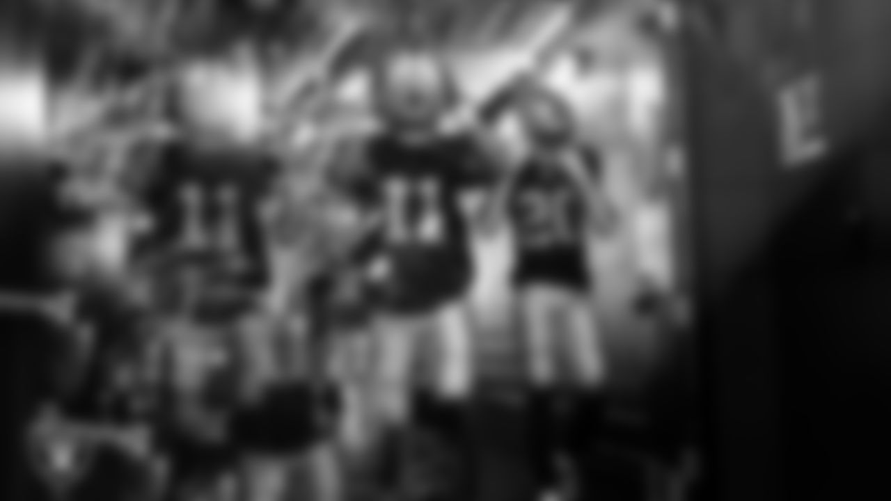 Las Vegas Raiders safety Jeremy Chinn (11) and safety Isaiah Pola-Mao (20) walk down the tunnel before the regular season home game against the Cleveland Browns at Allegiant Stadium.