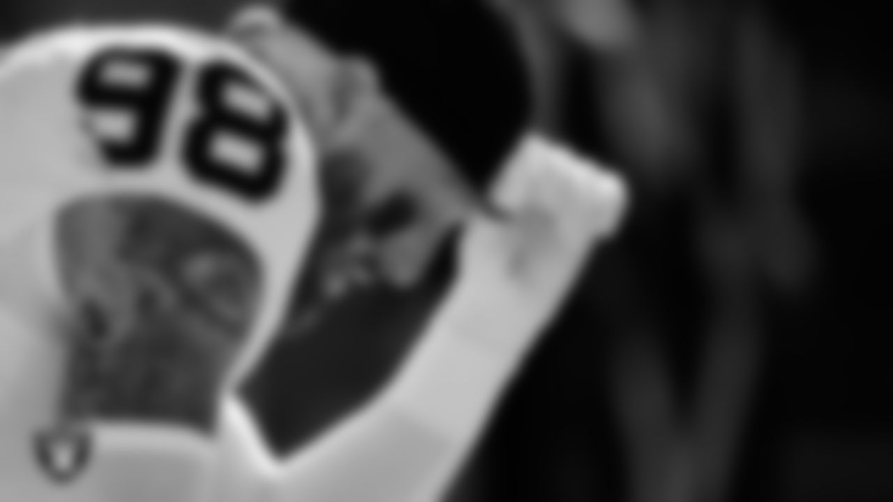 Las Vegas Raiders defensive end Maxx Crosby (98) as the team is introduced onto the field before their regular season away game against the Kansas City Chiefs at GEHA Field at Arrowhead Stadium.