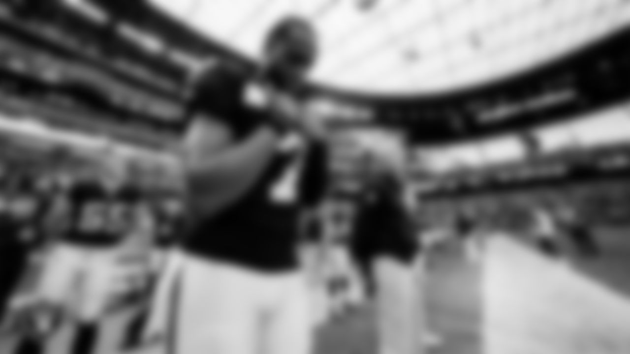 Las Vegas Raiders quarterback Geno Smith (7) during the national anthem before the regular season home game against the Denver Broncos at Allegiant Stadium.