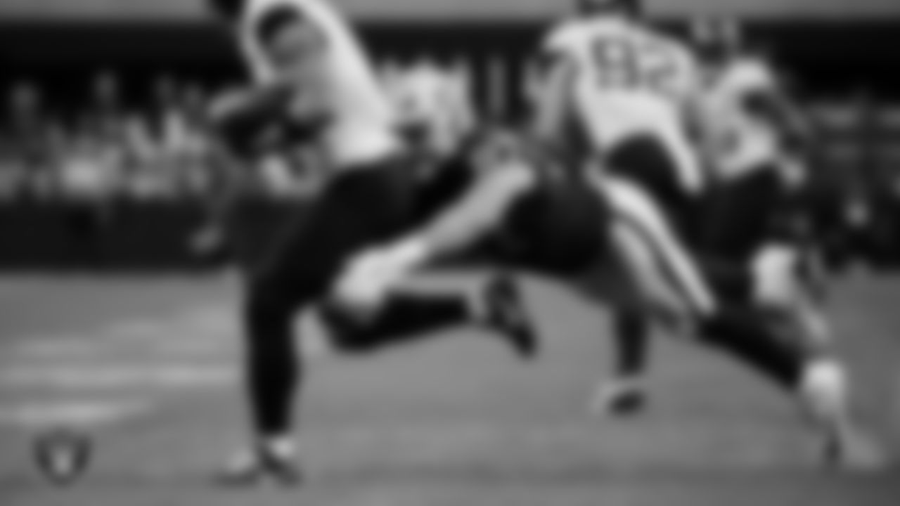 Las Vegas Raiders tight end Michael Mayer (87) makes a tackle during the regular season home game against the Jacksonville Jaguars at Allegiant Stadium.