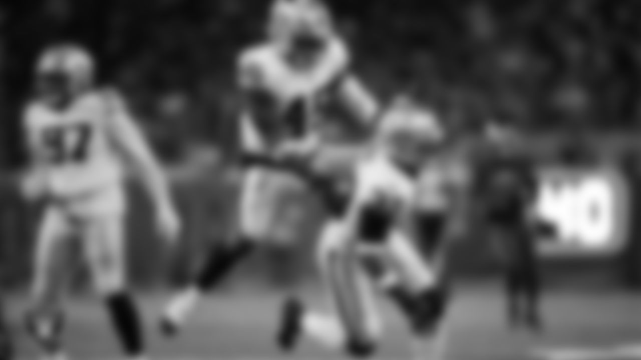 Las Vegas Raiders linebacker Jamal Adams (33) celebrates with linebacker Devin White (45) after making a tackle during the regular season away game against the Houston Texans at NRG Stadium.