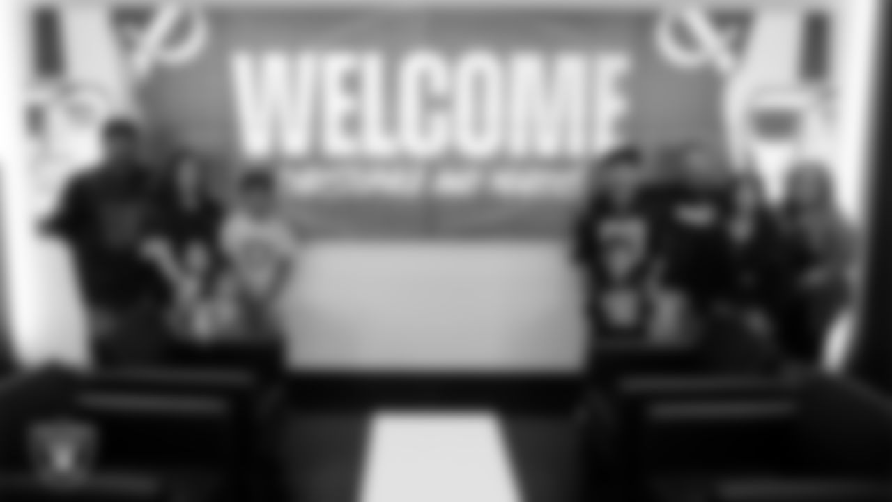 Christopher Arias and Marcos Carrillo and their families from Make-A-Wish during a visit to Intermountain Health Performance Center.