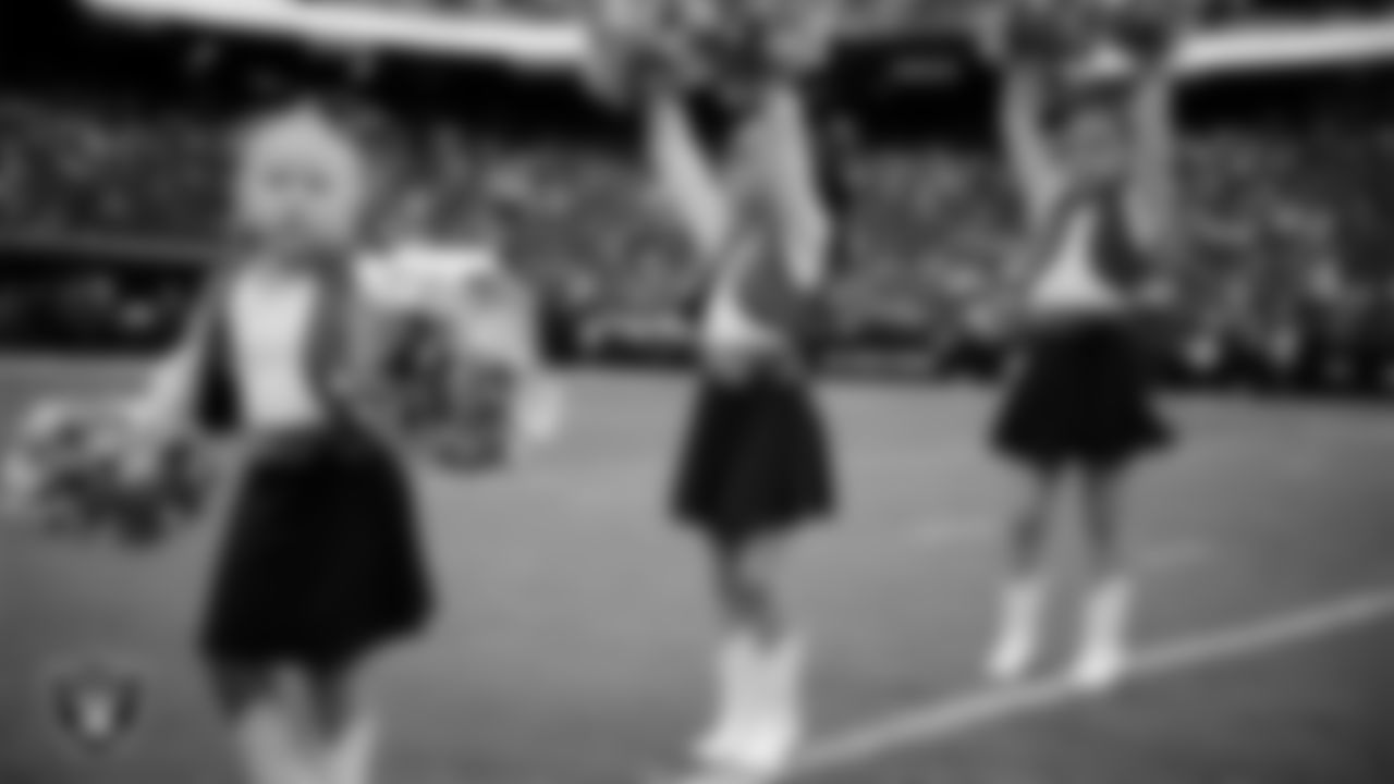 Junior Raiderettes perform on the field before the preseason home game against the San Francisco 49ers at Allegiant Stadium.